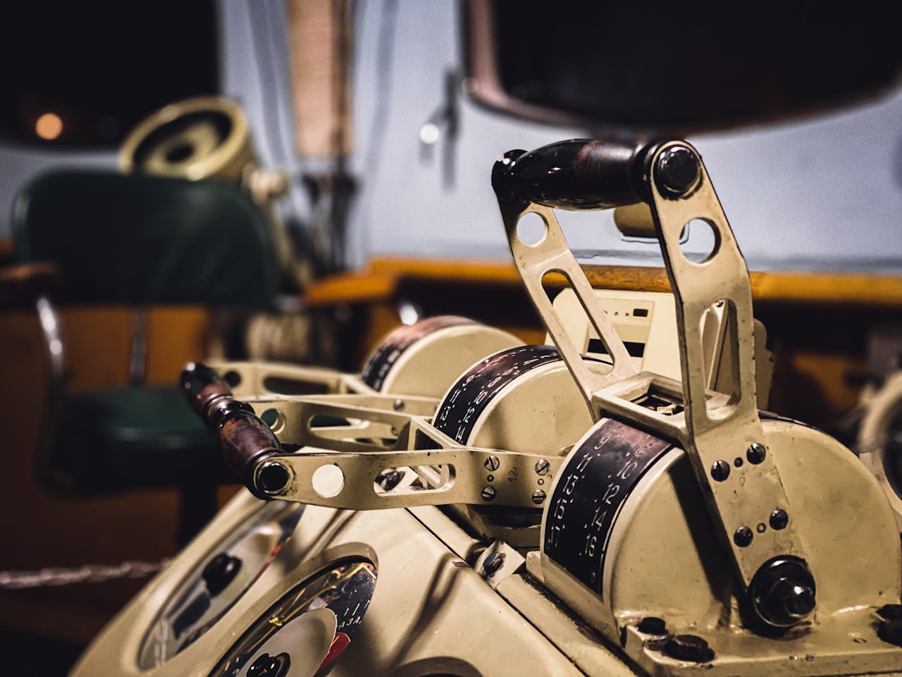 Close-up of vintage ship control levers inside a nautical cabin in Murmansk, Russia.